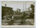 Photograph: [Four Soldiers on a Flatbed Truck]
