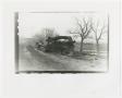 Photograph: [Photograph of a Wrecked and Burning Vehicle]