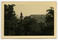 Photograph: [Photograph of a Building with a Large Tower]