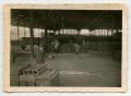 Photograph: [Soldiers Working in an Ammunition Shed]