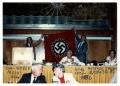 Photograph: [Photograph of Men Holding Nazi Flag]