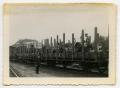 Photograph: [Nazi Soldiers Standing on Rail Cars]