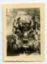Photograph: [Photograph of Soldiers on Tank]