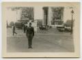 Primary view of [Photograph of Soldier and Arc de Triomphe]