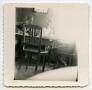 Photograph: [Photograph of a Soldier and Woman at a Table]