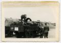 Photograph: [German Soldiers Working with a Tankwagen]