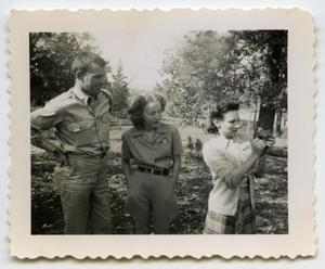 Primary view of object titled '[Photograph of a Soldier and Two Ladies]'.