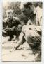 Photograph: [Two Soldiers Crouching on the Ground]