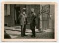 Photograph: [A German Officer Talking with a Civilian]