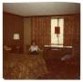 Photograph: [Photograph of Mrs. Britton in Hotel Room]