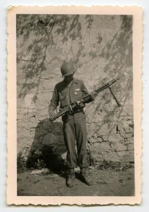 Primary view of object titled '[Photograph of Petross with Burp Gun]'.
