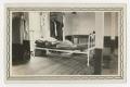Photograph: [Photograph of a Cadet Sleeping on his Bed]