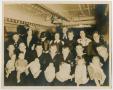 Photograph: [Photograph of Christened Babies with Parents]
