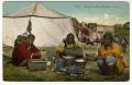 Postcard: [Postcard of Alaska Natives Around Cooking Fire]
