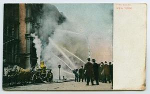 Primary view of object titled '[Postcard of Fire Fighters Extinguishing a Fire, New York]'.
