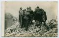 Postcard: [Postcard of Fire Fighters in a Ruined Building]