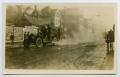 Thumbnail image of item number 1 in: '[Fire Truck Driving Down a Street]'.