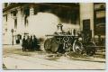 Thumbnail image of item number 1 in: '[Postcard with a Photograph of a Fire Engine by a Bank]'.