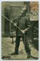 Postcard: [Postcard of a French Fireman with a Hose]