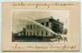 Primary view of [Postcard with a Photograph of Firemen Working a Fire Hose]