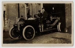Primary view of object titled '[Postcard with a Photo of a Houston Fire Department Automobile]'.