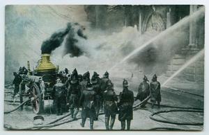 Primary view of object titled '[Postcard of Fire FIghters Extinguishing a Fire]'.