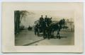 Postcard: [Postcard with a Photograph of a Horse-Drawn Wagon Walking]