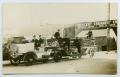 Thumbnail image of item number 1 in: '[Postcard of a Long Fire Truck on a Street]'.