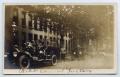 Postcard: [Postcard with a Line of Cars at a Factory]