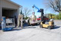 Photograph: [Attaching a Statue to a Forklift #4]
