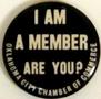 Physical Object: [Button that reads: "I AM A MEMBER ARE YOU? OKLAHOMA CITY CHAMBER OF …