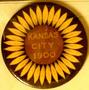 Physical Object: [Button sunflower on black background reads: "KANSAS CITY 1900"]