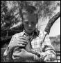 Primary view of [Ardon Judd with Baby Raccoon]