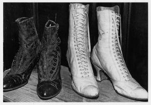 Primary view of object titled '[Photograph of Two Pairs of Women's Boots]'.