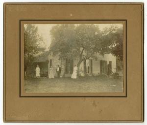Primary view of object titled '[Photograph of Three Generations of Pounds by their House]'.