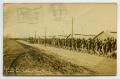 Primary view of [Postcard of Soldiers Marching at Camp MacArthur]