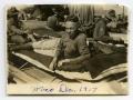Photograph: [Photograph of Soldier on Cot]