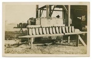Primary view of object titled '[Photograph of a Machine and Bread]'.