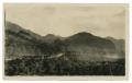 Primary view of [Photograph of Soldiers Riding through the Mountains]