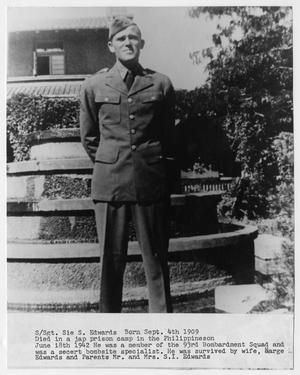 Primary view of object titled '[Photograph of Staff Sergeant Sie S. Edwards by a Fountain]'.