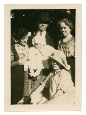 Primary view of object titled '[Photograph of Four Adults and a Small Child]'.
