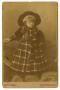 Photograph: [Portrait of Charles James Sweeney in a Plaid Dress]