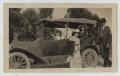 Photograph: [Photograph of Mayme Collins Bahl Sitting in the Back of a Car]