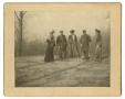 Primary view of [Photograph of a Group of Five People Amidst Trees]