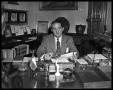 Photograph: Governor Shivers sitting at his desk