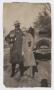 Photograph: [Photograph of a Couple with a Dog]