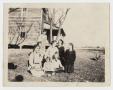 Photograph: [Photograph of Eight Individuals at the Turley Home]
