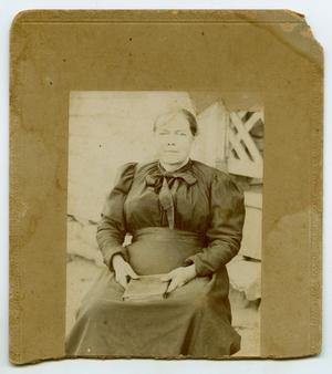 Primary view of object titled '[Portrait of Martha Catherine Matlock Brownfield Holding a Bible]'.