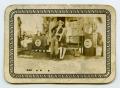 Thumbnail image of item number 1 in: '[Photograph of a Unknown Couple at a Gas Pump]'.