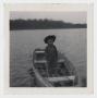 Primary view of [Photograph of David Kinser in a Boat]